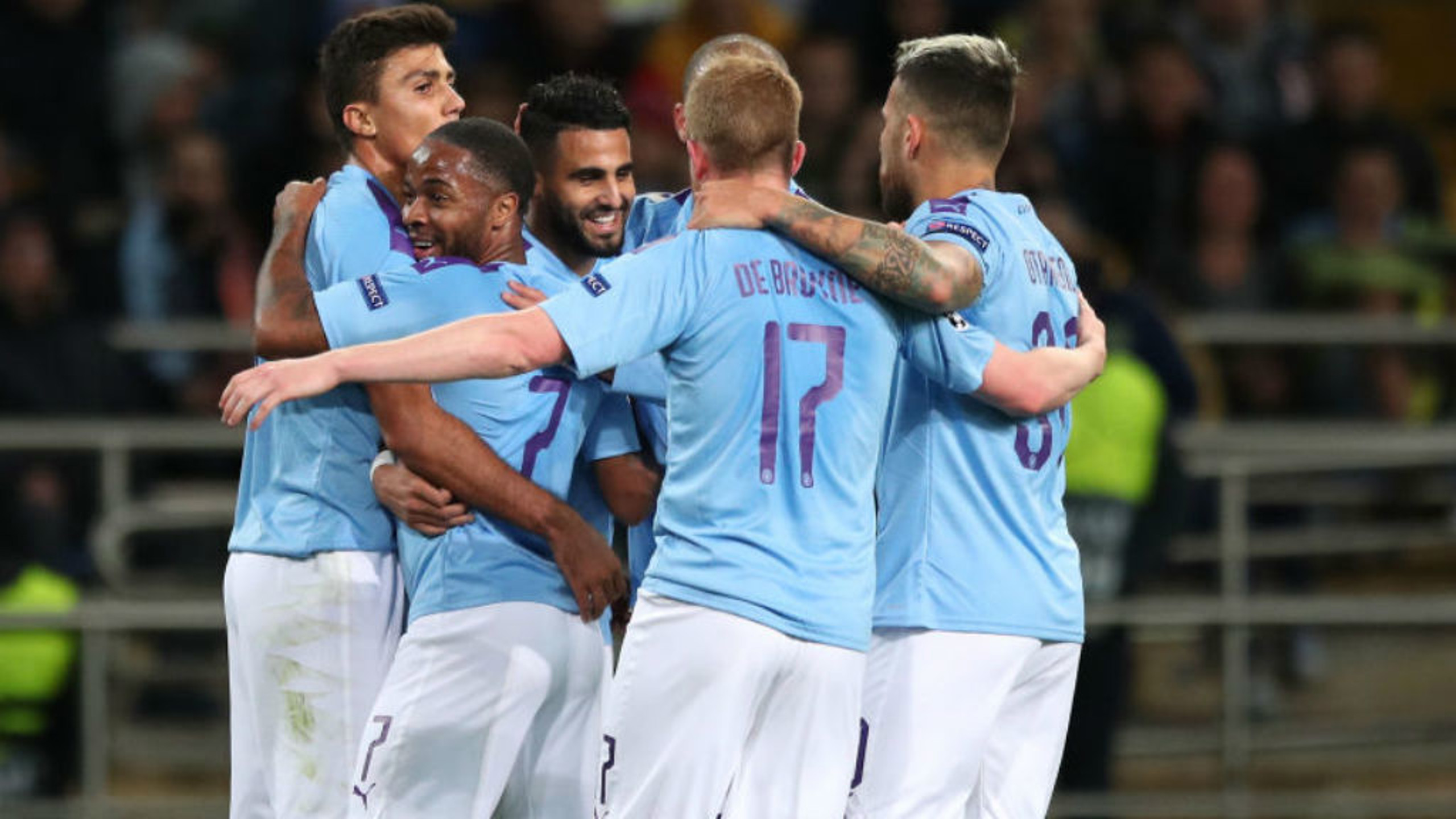 CENTRE OF ATTENTION: Riyad Mahrez is mobbed by his team-mates after his first half goal