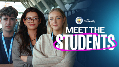 Blurred image of three people wearing lanyards with 'Meet the Students' text and the Manchester City logo.
