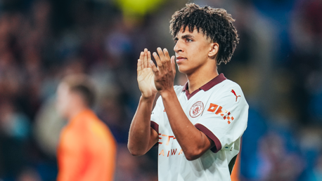 Rico Lewis applauds the City supporters after our opening day win against Burnley