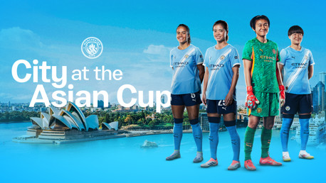 Four football players in Manchester City kits stand in front of a skyline featuring the Sydney Opera House, promoting 'City at the Asian Cup'.