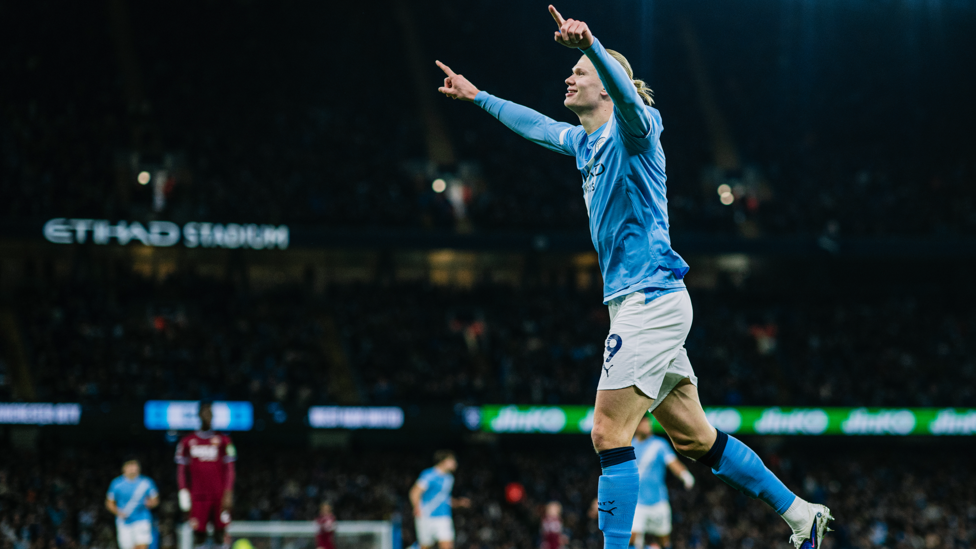 HIM AGAIN : Celebrates making it 3-0.