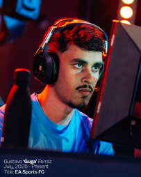 Person wearing a headset focused on a computer screen, labeled Gustavo 'Guga' Ferraz. Title: EA Sports FC. Date: July 2025 - Present.