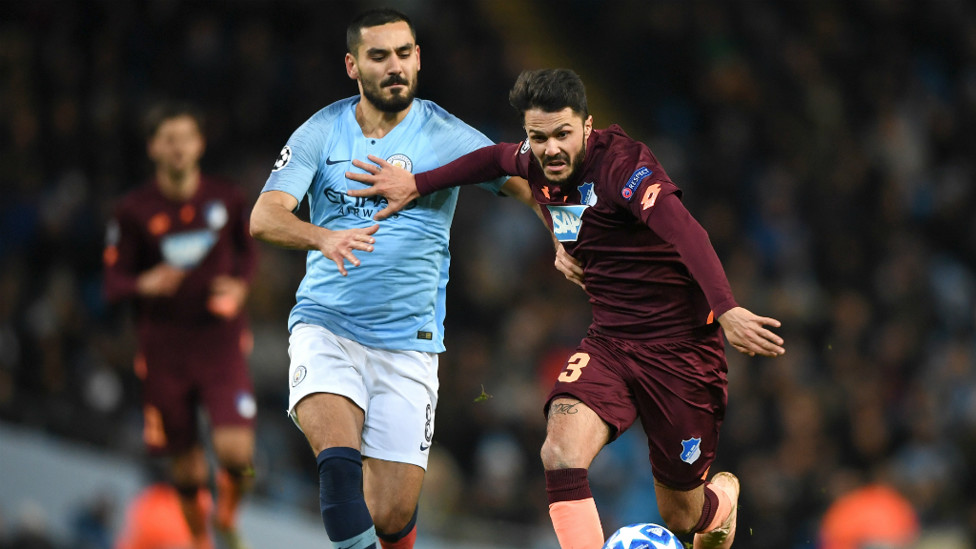 GERMAN ENGINEERING : Ilkay Gundogan in a midfield battle