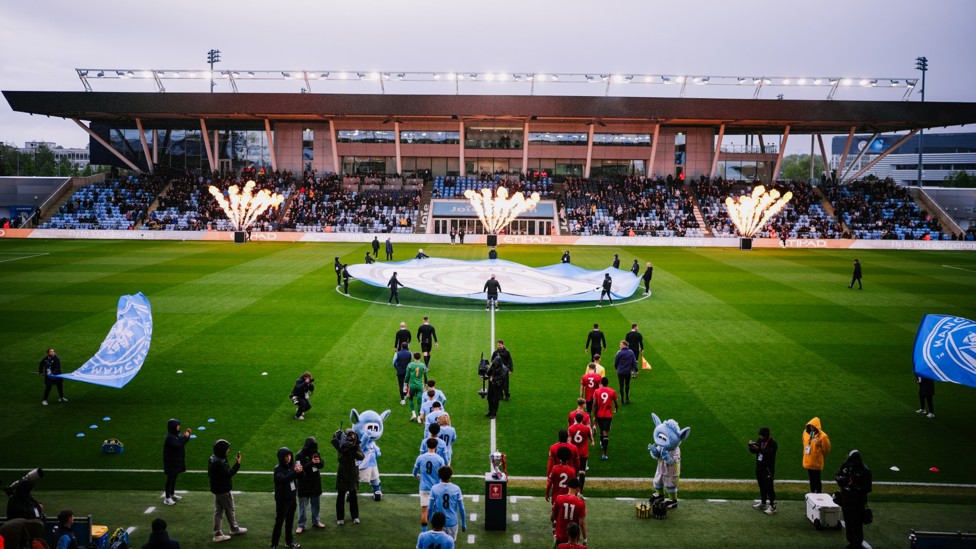 AND JUST LIKE THAT : The teams head out for kick-off.