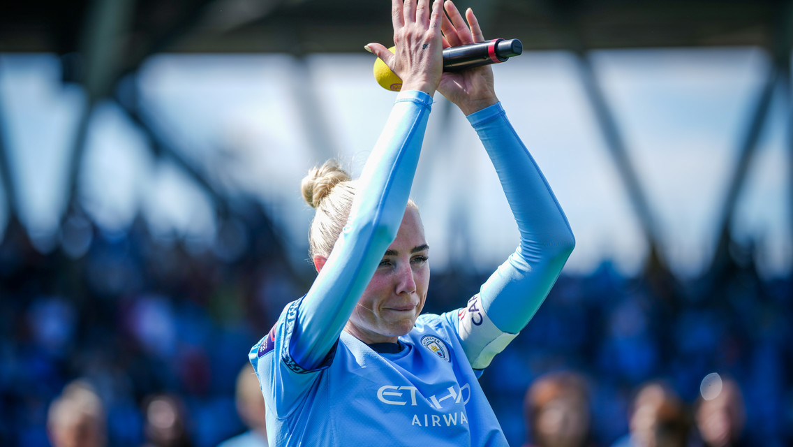 Alex Greenwood applauds the Manchester City fans