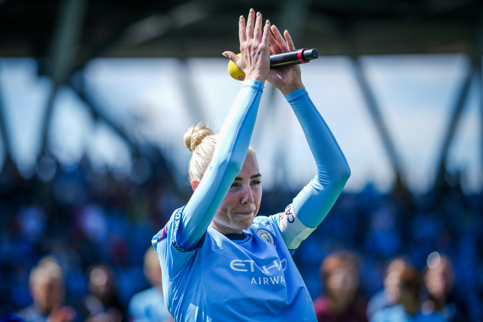 Thank you : Alex Greenwood thanking the Man City supporters on the final day of the season