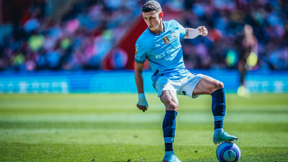PHIL-ING IT : Foden looking for a way through the Southampton defence.