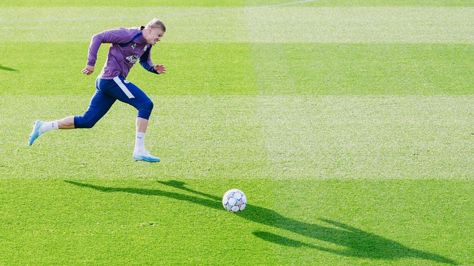 ON YOUR MARKS : Erling Haaland races onto the ball 