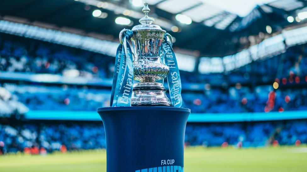 EYES ON THE PRIZE : Our FA Cup trophy makes an appearance at the Etihad.