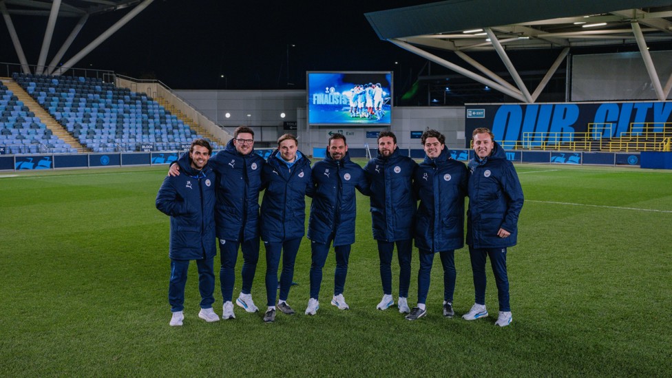 THE TEAM BEHIND THE TEAM : Oliver Reiss and his coaching staff celebrate a memorable night.