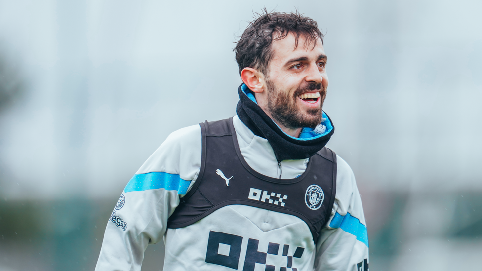 SMILING SILVA : The rain won't ruin Bernardo Silva's mood