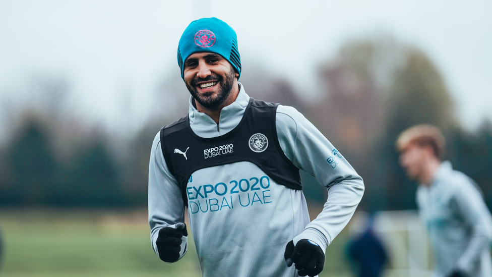 MAHRVELLOUS : Riyad Mahrez shows off his pearly whites!