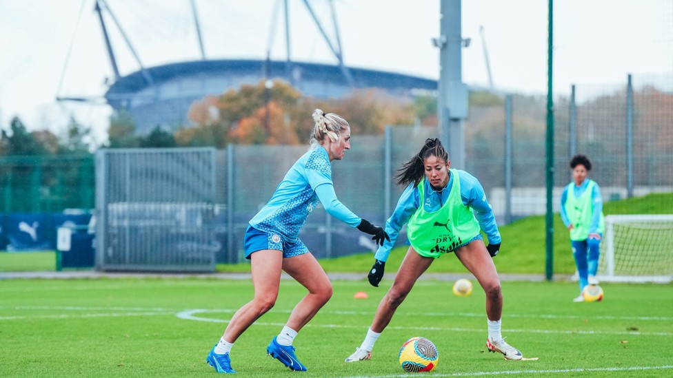 ENERGETIC : Leila Ouahabi determined to win the ball from Laura Coombs. 