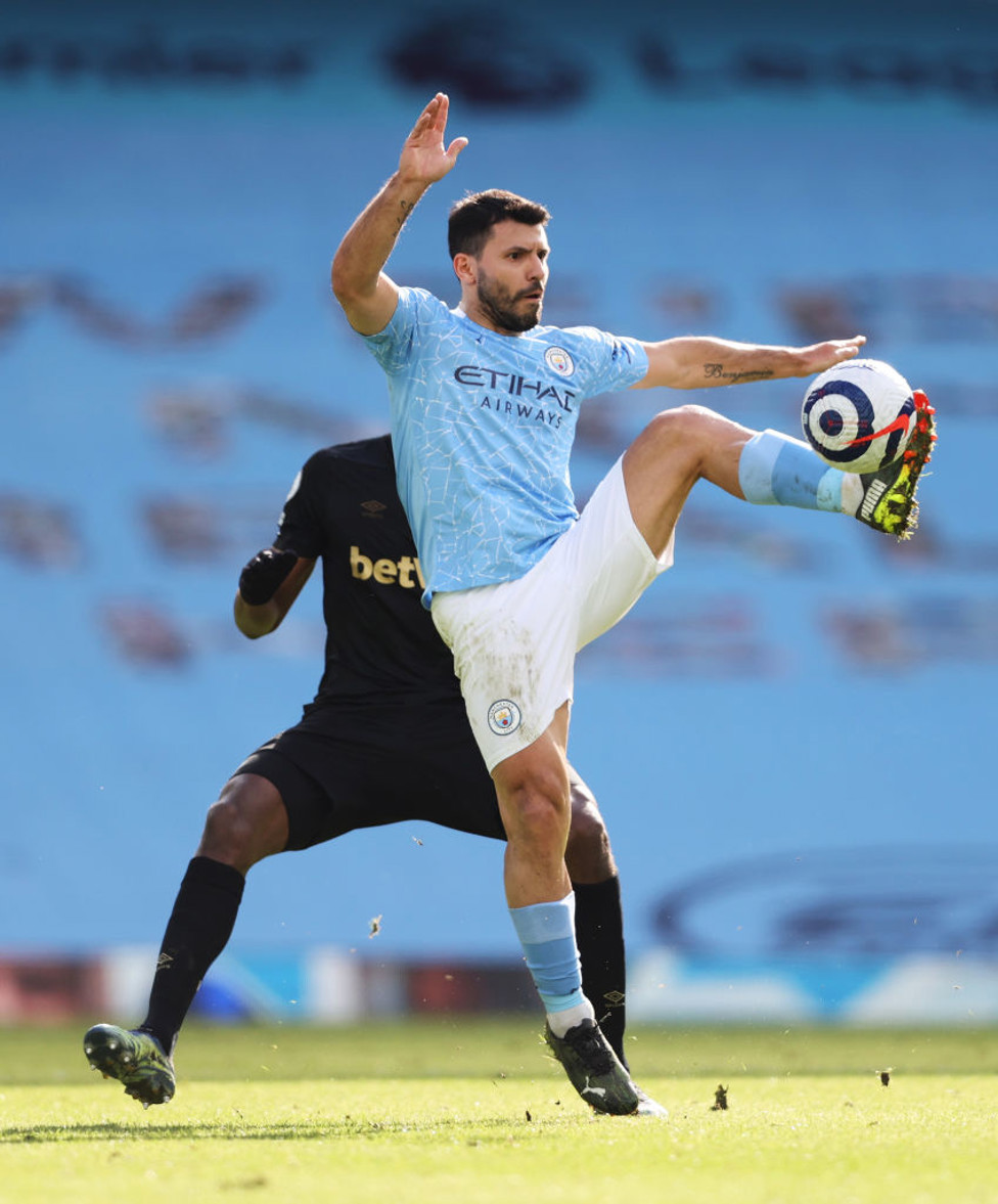 PERFECT TOUCH : Aguero gets the ball under control as City push forward in the second half.