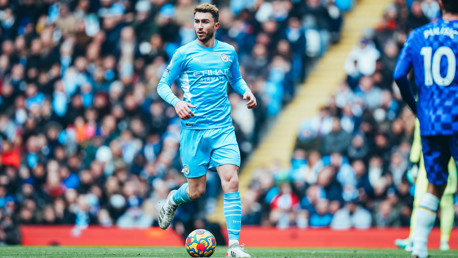 CLASS: Laporte brings the ball out of defence 
