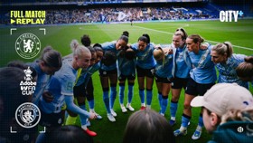Manchester City Women's team huddle on the football field. Logos of Chelsea, WFA Cup, and Manchester City are visible, and the text 'Full Match Replay' and 'City+' are on the image.