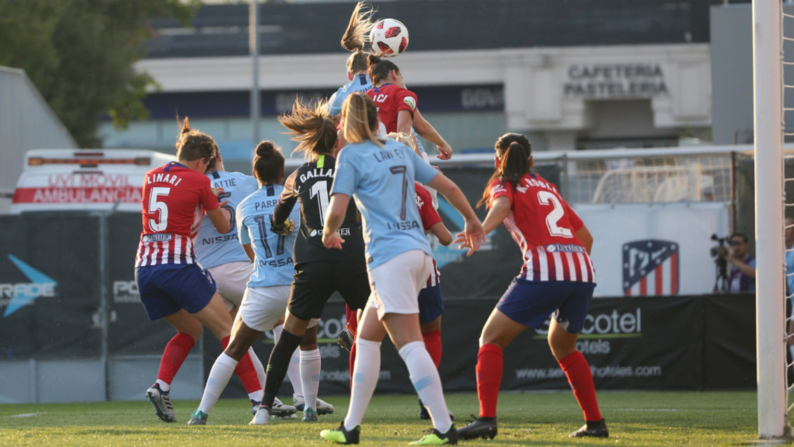 ON YER HEAD: Gemma Bonner rises highest to head home the opener