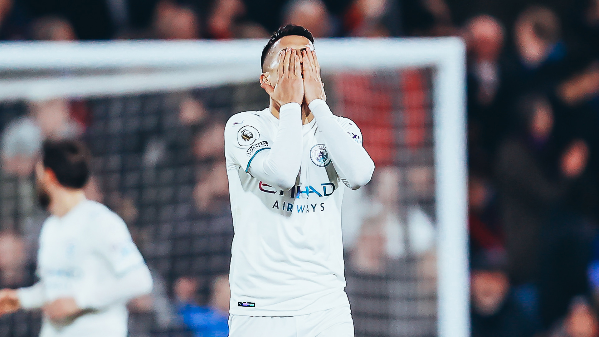 AGONY: Joao Cancelo's expression says it all after his shot hit the post