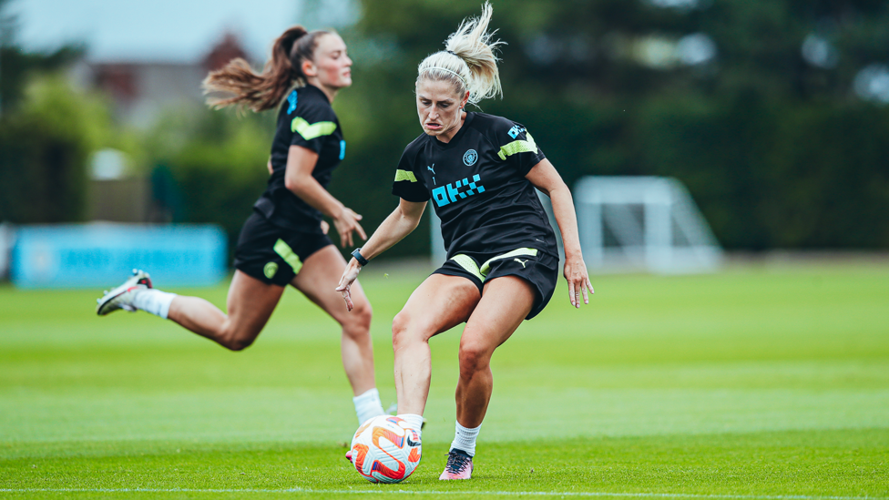MIDFIELD DYNAMO : Laura Coombs in the thick of the action