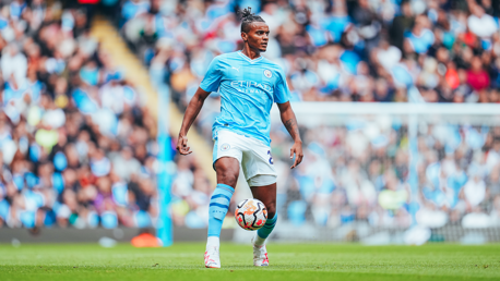 AKANJI: Plays the ball forward.
