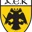 Logo of AEK FC with a black double-headed eagle on a yellow shield and 'AEK F.C.' text at the bottom.