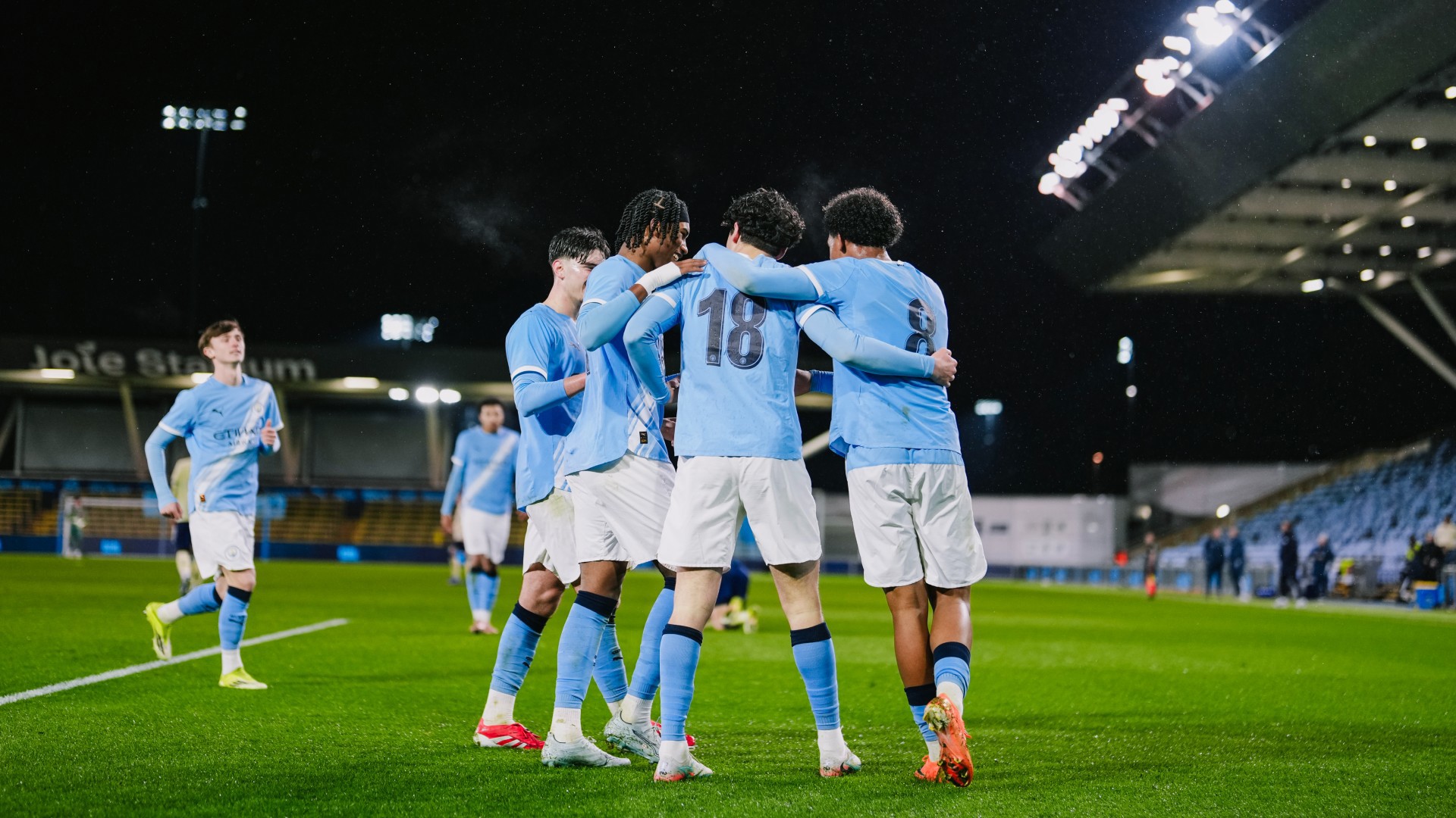 TOGETHER : City Under-18s celebrate another. 