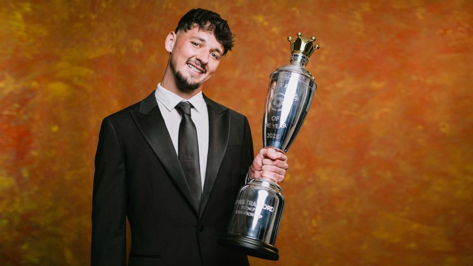 THE WINNER TAKES IT ALL: James Trafford wears a big smile as he picks up his PFA award after his time at Burnley