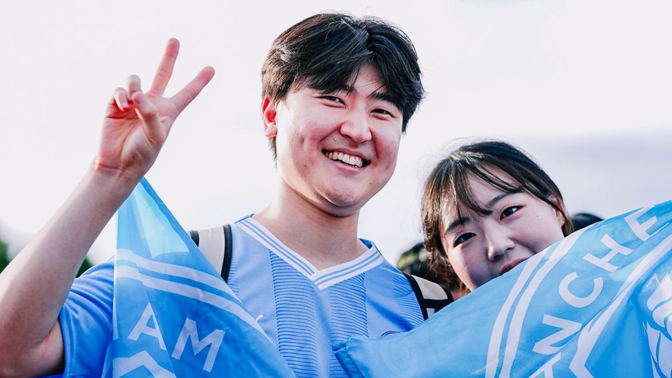 BLUES IN TOWN: Two of our many thousands of Korean City fans