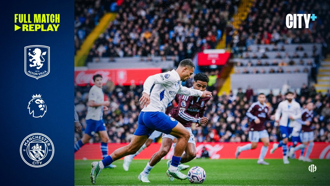 A soccer match between Aston Villa and Manchester City, players actively engaged on the field during a Premier League game. The display includes logos of both teams and the Premier League.