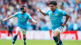 LOVELY LEWIS: Celebrates the goal.