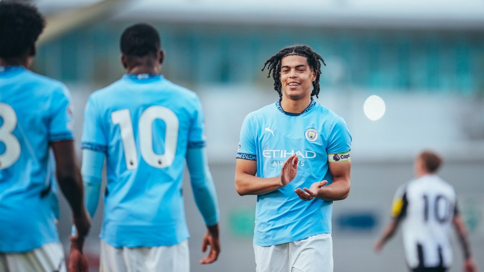 ROUND OF APPLAUSE : Jahmai Simpson-Pusey showing his appreciation for Justin Oboavwoduo's goal. 