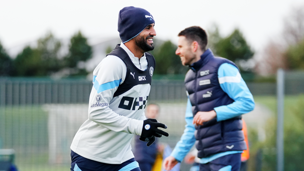 ALL SMILES  : Riyad Mahrez in understandingly good spirits after netting against Liverpool last time out 