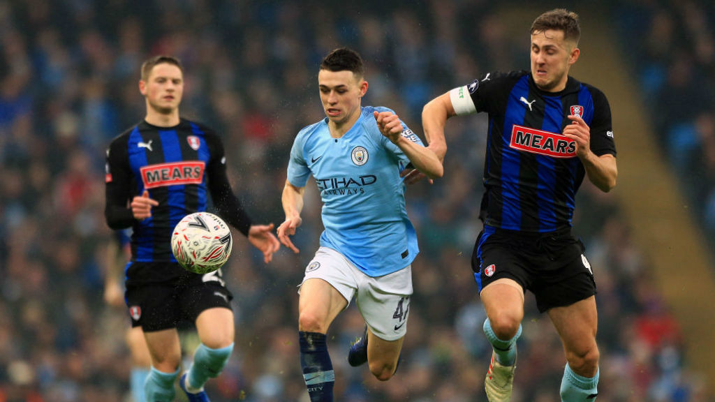 TEEN SPIRIT: Phil Foden takes the fight to the Rotherham back-line
