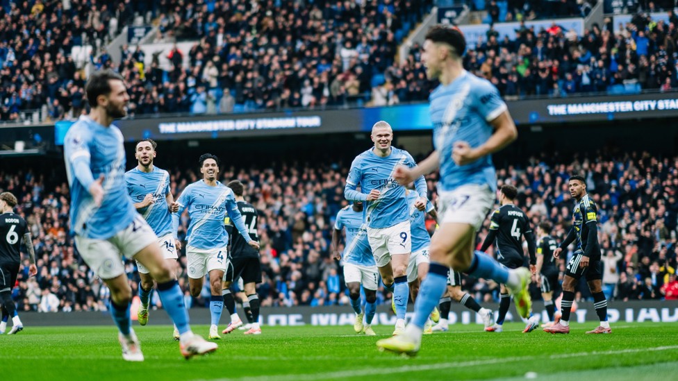 EARLY STRIKE : Foden and co celebrate our opener inside a minute!