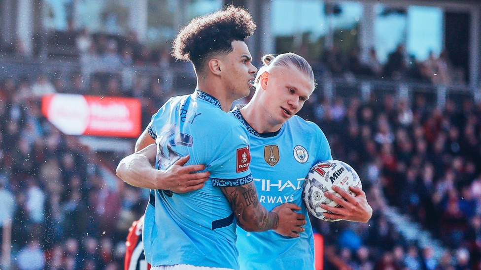 SUPER SUB : Nico O'Reilly and Erling Haaland celebrate their link-up.