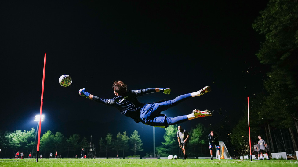 FULL STRETCH! Triallist goalkeeper Max Chabot takes flight