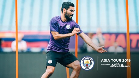 SLALOM: Ilkay Gundogan hard at work.