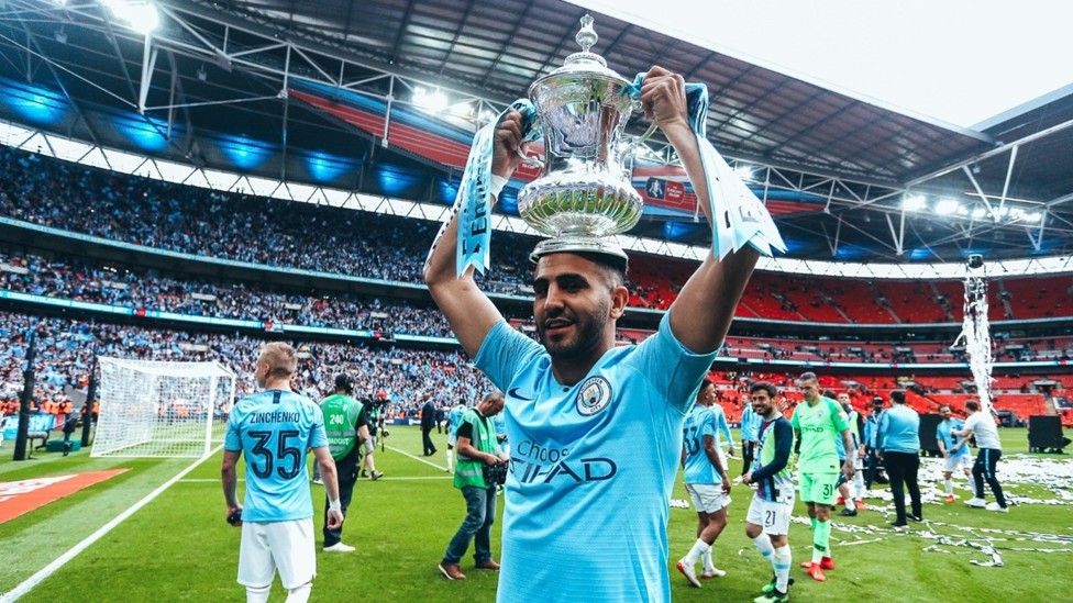 UP FOR THE CUP : Mahrez soaks up the atmosphere as City celebrate beating Watford in the 2019 FA Cup final. 