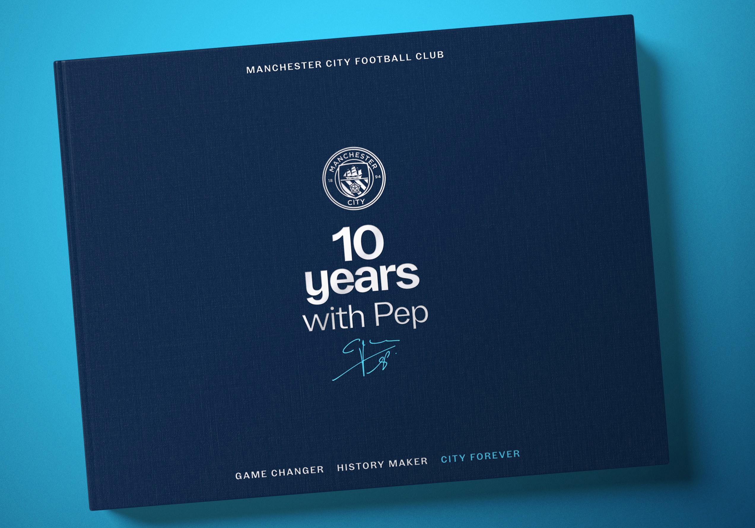 Book cover titled '10 years with Pep' featuring Manchester City Football Club logo and signature.