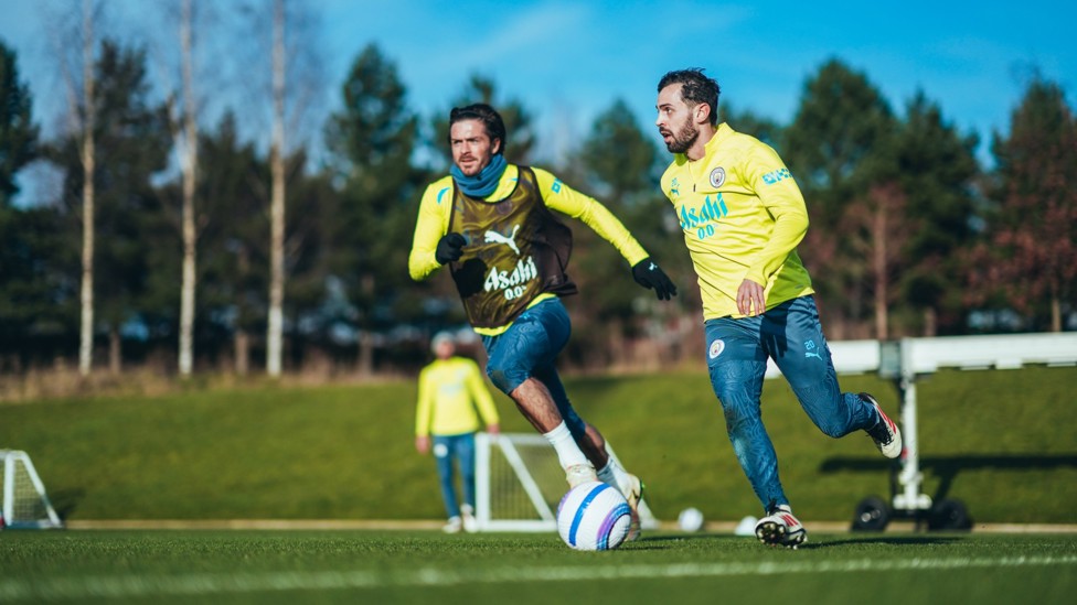 WING WIZARDS  : Bernardo Silva dribbles as Jack Grealish tracks. 