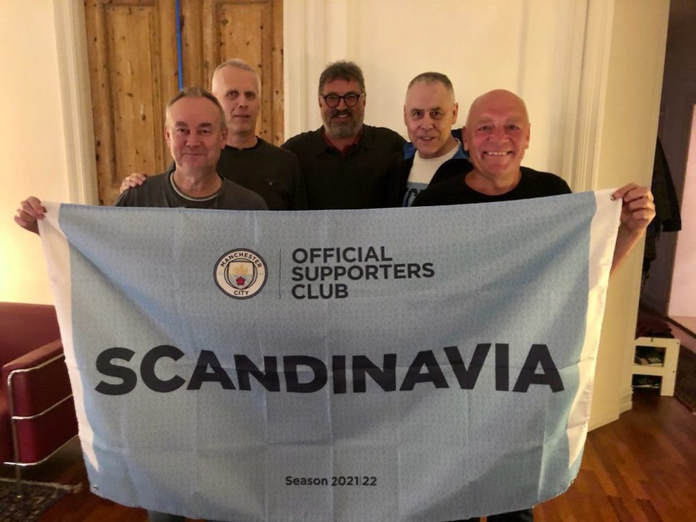 WINNING SMILES: Our Scandinavia members show their backing 