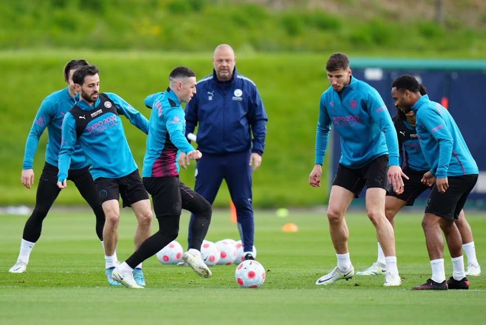 SQUAD GOALS: Phil Foden and the lads go through some close control drills