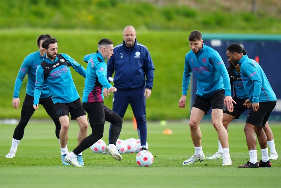 SQUAD GOALS: Phil Foden and the lads go through some close control drills