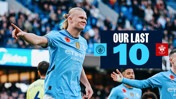 Blurred players from Manchester City celebrating with a graphic overlay indicating 'Our Last 10' and logos of Manchester City and Southampton.