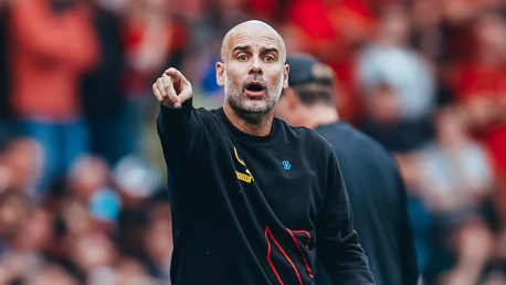 PEP TALK: The boss provides instructions from the touchline.