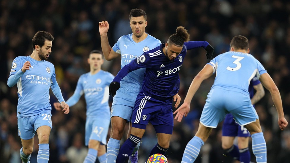 INTO THE THICK OF IT : Rodri and Roberts get straight into the battle. 