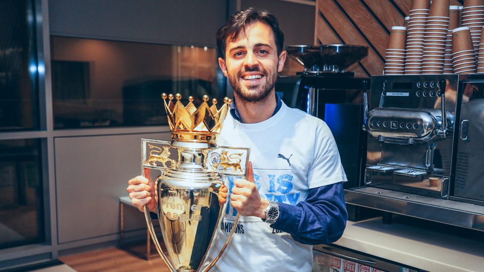 TITLE SECURED : Players and staff celebrate becoming Premier League champions with a party at the City Football Academy, 11th May.