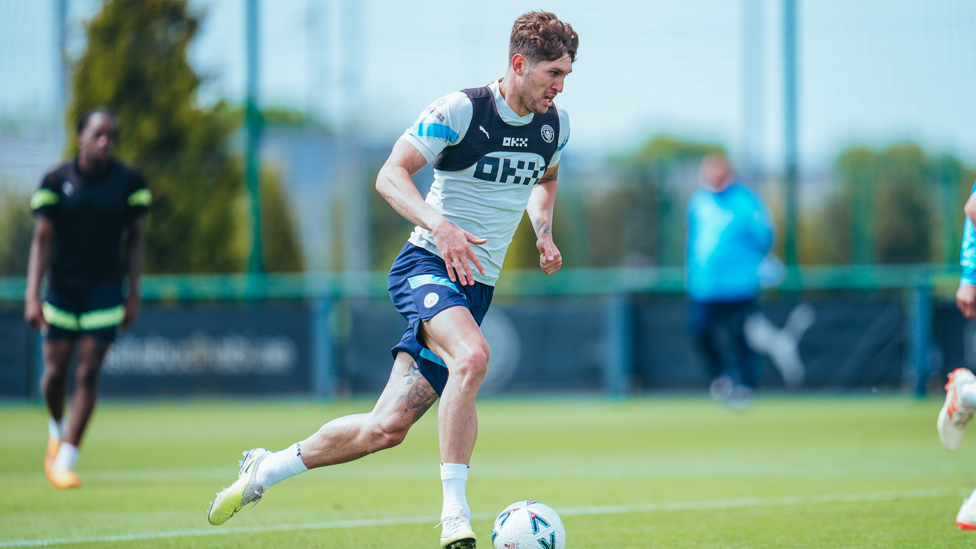 JOHNNY, JOHNNY STONES! : City defender John Stones is fully focused with the ball at his feet. 
