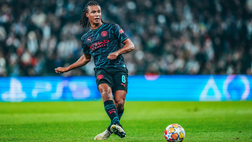 LEVEL TERMS : Ake plays forward shortly after the hosts' equaliser.