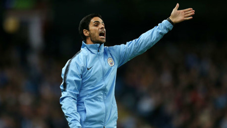 SHOUTING THE ODDS: Mikel Arteta passes on instructions to the City players